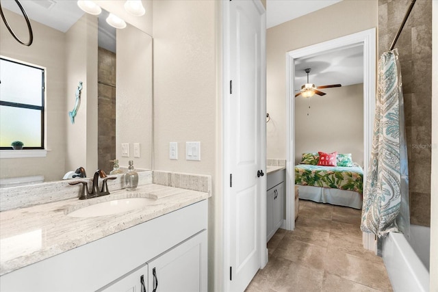 15044 San Domingo Blvd, Port Charlotte, FL 33981 - ensuite bathroom with vanity, a ceiling fan, and shower / bath combo with shower curtain