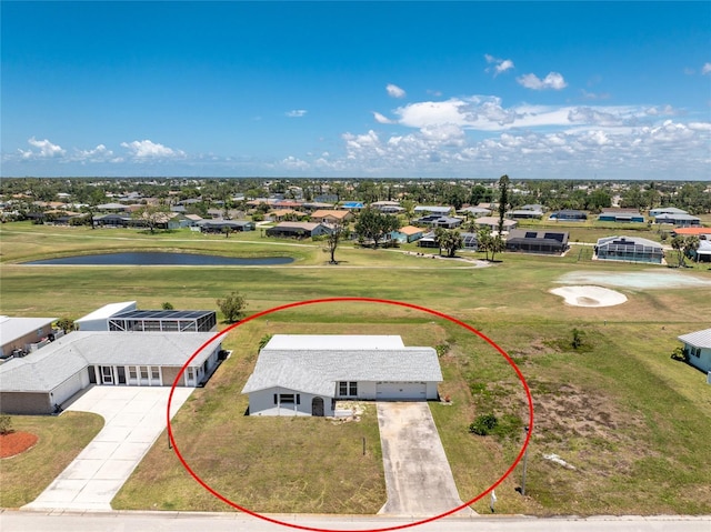 11 Oakland Hills Rd, Rotonda West, FL 33947 - aerial view of residential area featuring a large body of water