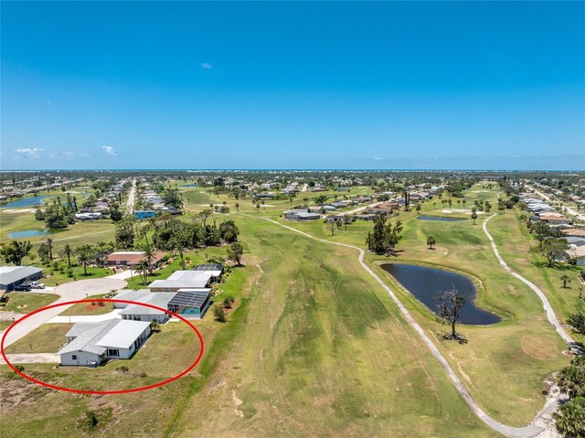 11 Oakland Hills Rd, Rotonda West, FL 33947 - aerial perspective of suburban area featuring a nearby body of water and a local golf course