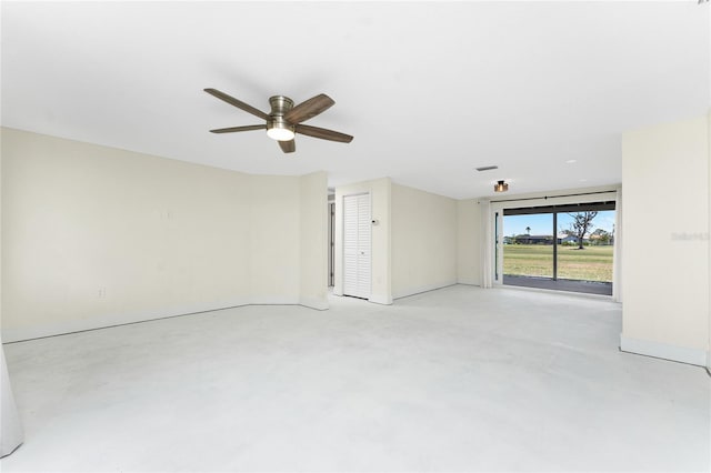 11 Oakland Hills Rd, Rotonda West, FL 33947 - empty room featuring ceiling fan and concrete floors