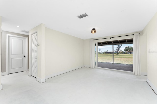 11 Oakland Hills Rd, Rotonda West, FL 33947 - unfurnished room with concrete flooring, baseboards, and recessed lighting