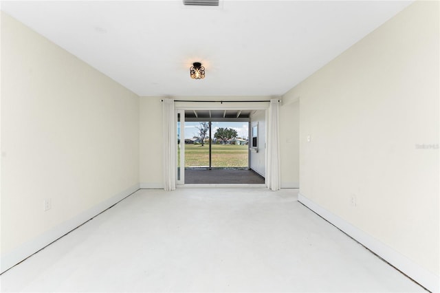 11 Oakland Hills Rd, Rotonda West, FL 33947 - empty room featuring finished concrete floors