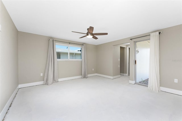 11 Oakland Hills Rd, Rotonda West, FL 33947 - spare room with ceiling fan and baseboards