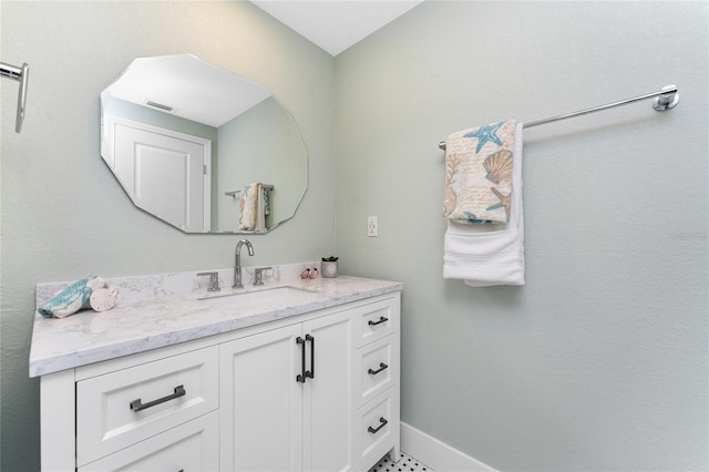11 Oakland Hills Rd, Rotonda West, FL 33947 - bathroom featuring vanity and baseboards