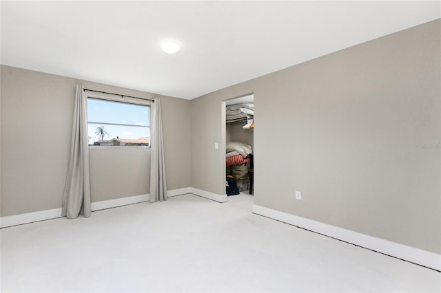 11 Oakland Hills Rd, Rotonda West, FL 33947 - spare room featuring baseboards and light colored carpet