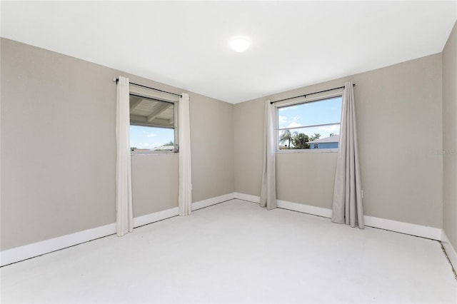 11 Oakland Hills Rd, Rotonda West, FL 33947 - empty room with baseboards