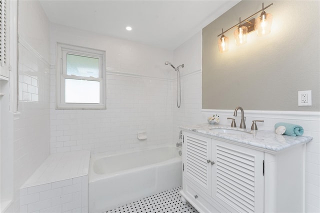 11 Oakland Hills Rd, Rotonda West, FL 33947 - full bath featuring a wainscoted wall, tub / shower combination, and vanity