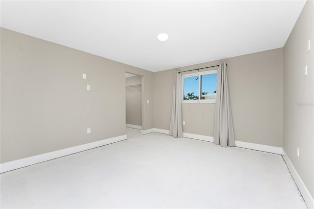 11 Oakland Hills Rd, Rotonda West, FL 33947 - empty room with baseboards