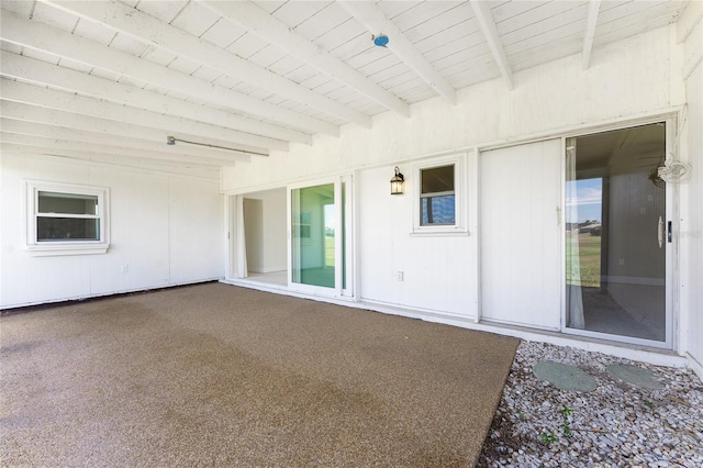 11 Oakland Hills Rd, Rotonda West, FL 33947 - unfurnished sunroom featuring beam ceiling