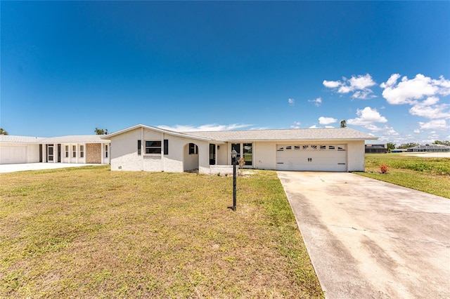11 Oakland Hills Rd, Rotonda West, FL 33947 - ranch-style house featuring concrete driveway, a garage, a front lawn, and stucco siding