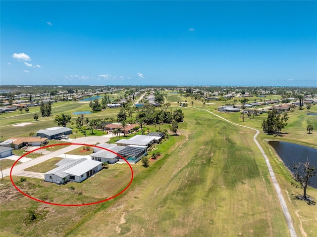 11 Oakland Hills Rd, Rotonda West, FL 33947 - drone / aerial view of a large body of water and a golf club