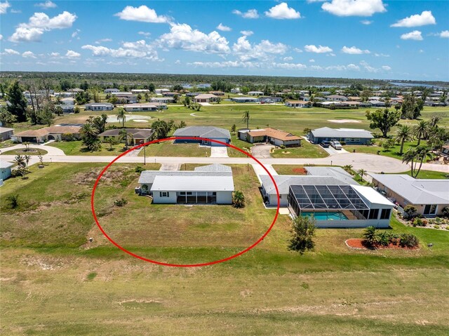 11 Oakland Hills Rd, Rotonda West, FL 33947 - aerial perspective of suburban area with a pool