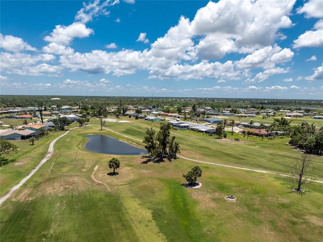 11 Oakland Hills Rd, Rotonda West, FL 33947 - aerial perspective of suburban area with a nearby body of water and a golf club