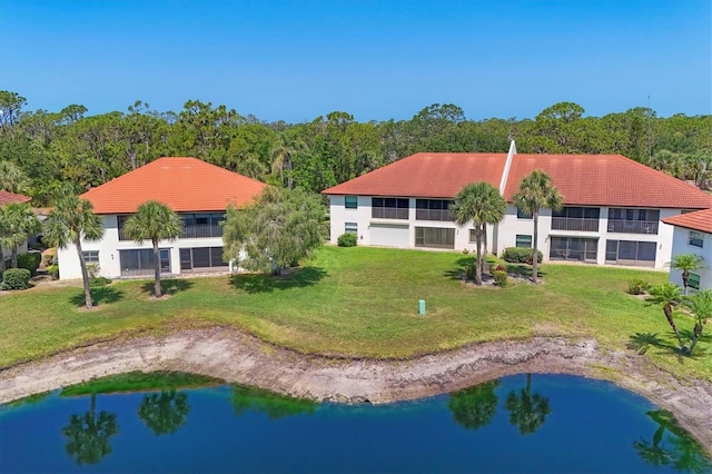 507 Pine Hollow Cir Unit 507, Englewood, FL 34223 - aerial view of property and surrounding area featuring a nearby body of water and a forest