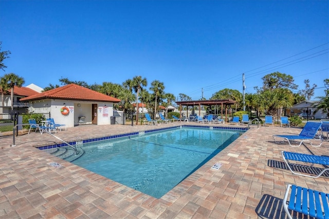 507 Pine Hollow Cir Unit 507, Englewood, FL 34223 - community pool with fence, a patio, and a gazebo