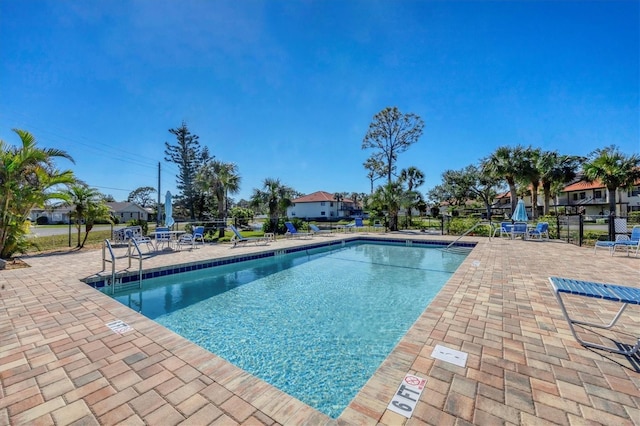 507 Pine Hollow Cir Unit 507, Englewood, FL 34223 - community pool with a patio and fence
