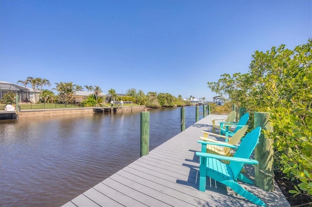 dock area featuring a water view