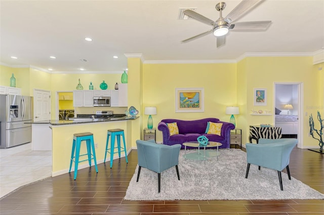 2692 Wax Myrtle Ct, Port Charlotte, FL 33953 - living room featuring crown molding, wood finish floors, ceiling fan, baseboards, and recessed lighting