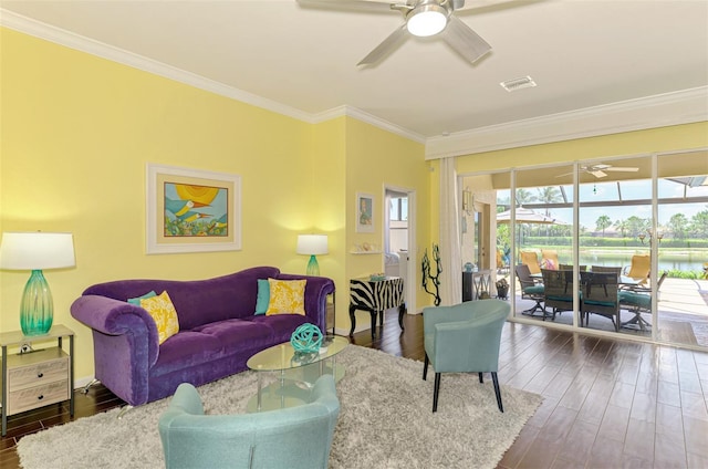 2692 Wax Myrtle Ct, Port Charlotte, FL 33953 - living room featuring ceiling fan, crown molding, dark wood-style flooring, a water view, and baseboards