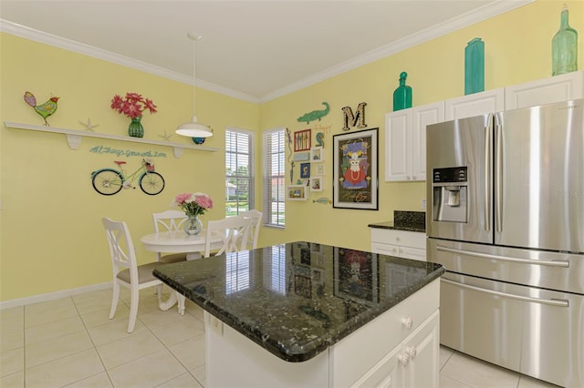 2692 Wax Myrtle Ct, Port Charlotte, FL 33953 - kitchen featuring stainless steel fridge with ice dispenser, light tile patterned floors, white cabinetry, crown molding, and pendant lighting