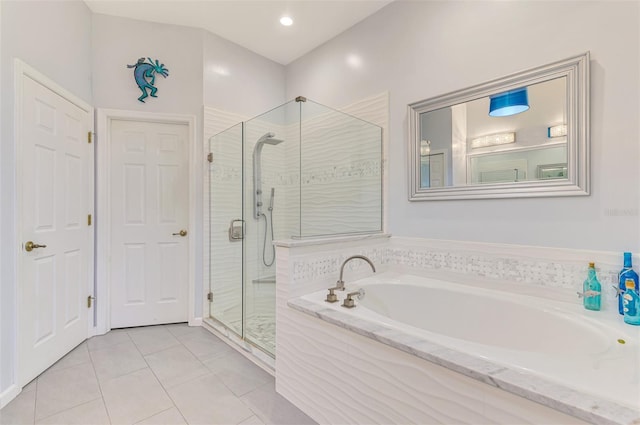 2692 Wax Myrtle Ct, Port Charlotte, FL 33953 - bathroom featuring a garden tub, a stall shower, and tile patterned flooring