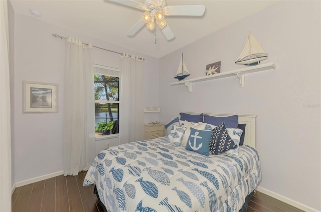 2692 Wax Myrtle Ct, Port Charlotte, FL 33953 - bedroom with baseboards, wood finished floors, and ceiling fan