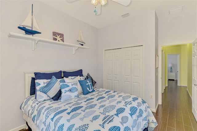 2692 Wax Myrtle Ct, Port Charlotte, FL 33953 - bedroom featuring baseboards, a closet, wood finished floors, and a ceiling fan