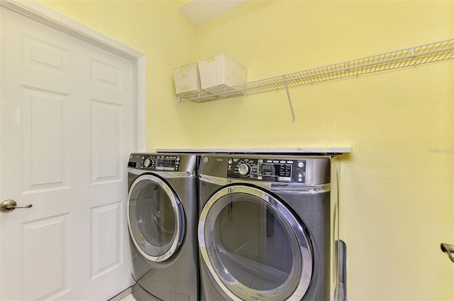2692 Wax Myrtle Ct, Port Charlotte, FL 33953 - laundry area with washing machine and clothes dryer