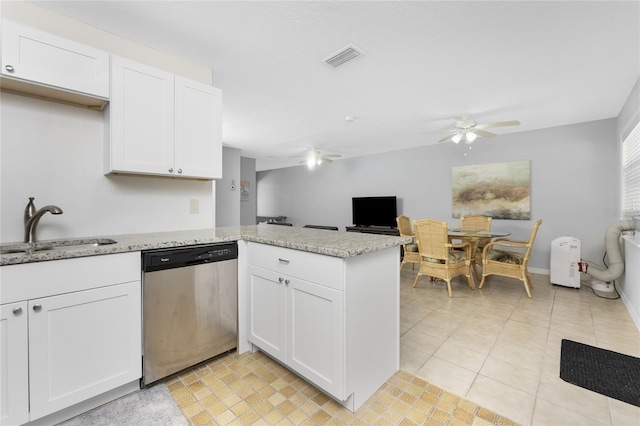 5041 N Beach Road 2A And 2B, Englewood, FL 34223 - kitchen featuring dishwasher, a sink, ceiling fan, open floor plan, and white cabinetry