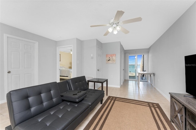5041 N Beach Road 2A And 2B, Englewood, FL 34223 - living area featuring ceiling fan, light tile patterned floors, and baseboards
