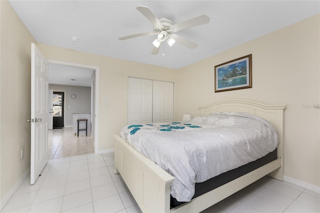5041 N Beach Road 2A And 2B, Englewood, FL 34223 - bedroom featuring light tile patterned floors, baseboards, a closet, and ceiling fan