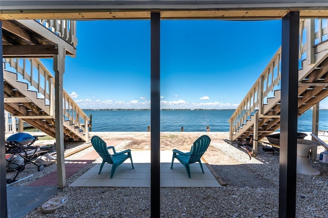 5041 N Beach Road 2A And 2B, Englewood, FL 34223 - view of patio / terrace featuring stairway and a water view