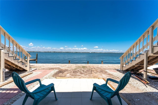 5041 N Beach Road 2A And 2B, Englewood, FL 34223 - view of patio featuring stairs and a water view
