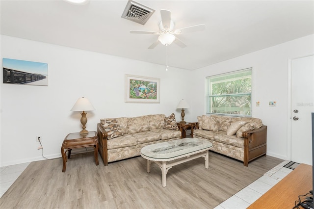 5041 N Beach Road 2A And 2B, Englewood, FL 34223 - living room featuring light wood finished floors, ceiling fan, and baseboards