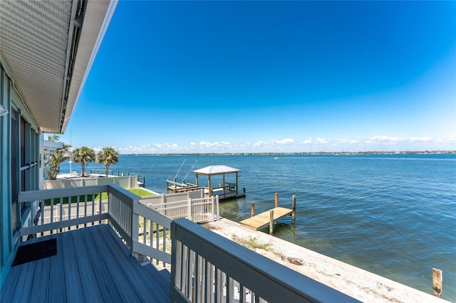 5041 N Beach Road 2A And 2B, Englewood, FL 34223 - balcony featuring a water view and a boat dock