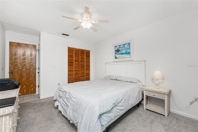 5041 N Beach Road 2A And 2B, Englewood, FL 34223 - bedroom featuring carpet, a closet, baseboards, and a ceiling fan