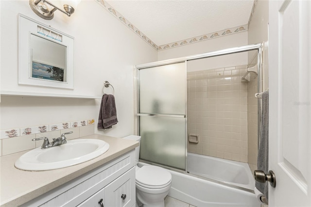 5041 N Beach Road 2A And 2B, Englewood, FL 34223 - full bathroom featuring vanity, toilet, enclosed tub / shower combo, and a textured ceiling