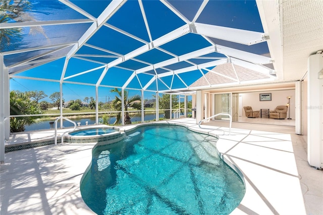 1157 Rotonda Cir, Rotonda West, FL 33947 - view of pool with a patio area, a water view, a pool with connected hot tub, and glass enclosure