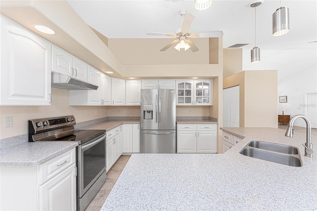 1157 Rotonda Cir, Rotonda West, FL 33947 - kitchen featuring stainless steel appliances, under cabinet range hood, a sink, white cabinets, and a ceiling fan