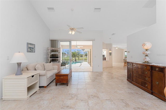 1157 Rotonda Cir, Rotonda West, FL 33947 - living room with ceiling fan and plenty of natural light