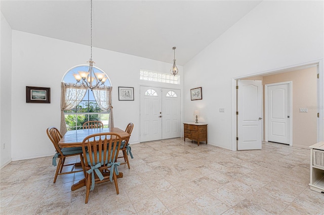 1157 Rotonda Cir, Rotonda West, FL 33947 - dining area with high vaulted ceiling and a chandelier