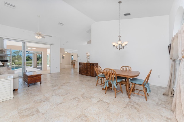 1157 Rotonda Cir, Rotonda West, FL 33947 - dining area with a ceiling fan, a chandelier, and high vaulted ceiling