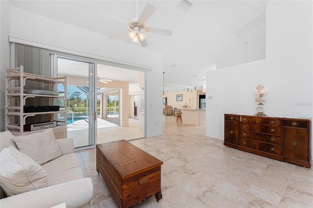 1157 Rotonda Cir, Rotonda West, FL 33947 - living area featuring a ceiling fan and vaulted ceiling