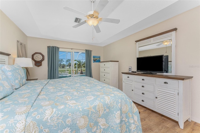 1157 Rotonda Cir, Rotonda West, FL 33947 - bedroom featuring light wood-type flooring and a ceiling fan