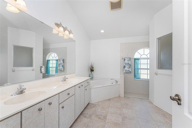 1157 Rotonda Cir, Rotonda West, FL 33947 - bathroom featuring a bath, double vanity, and walk in shower
