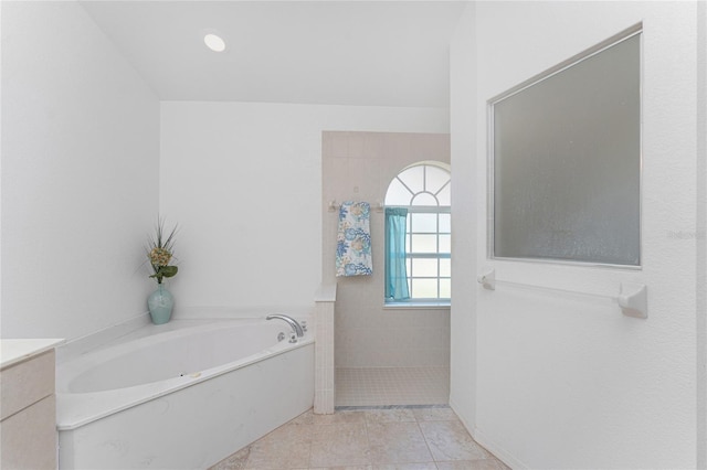1157 Rotonda Cir, Rotonda West, FL 33947 - full bath with a garden tub, walk in shower, and vanity