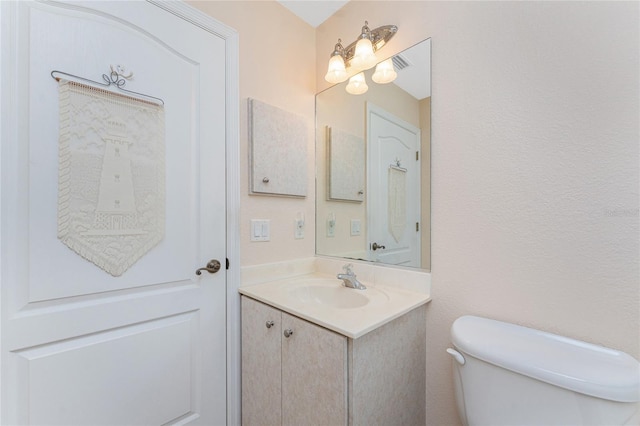 1157 Rotonda Cir, Rotonda West, FL 33947 - half bath featuring vanity and toilet