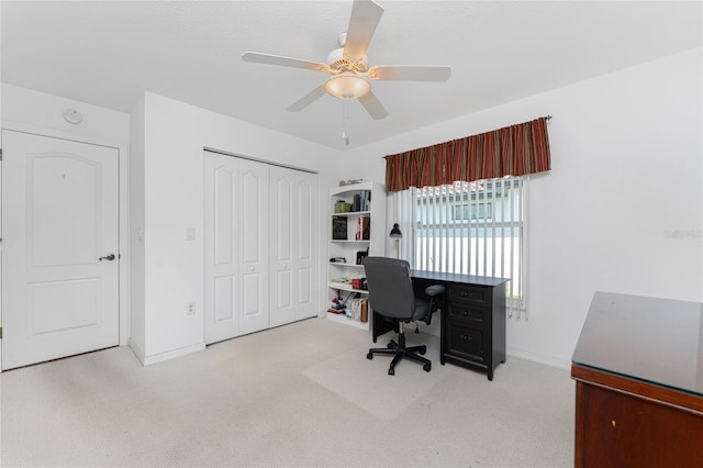 1157 Rotonda Cir, Rotonda West, FL 33947 - office with carpet, a ceiling fan, and baseboards