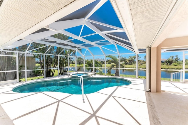 1157 Rotonda Cir, Rotonda West, FL 33947 - view of swimming pool featuring a patio, a water view, a pool with connected hot tub, and a lanai