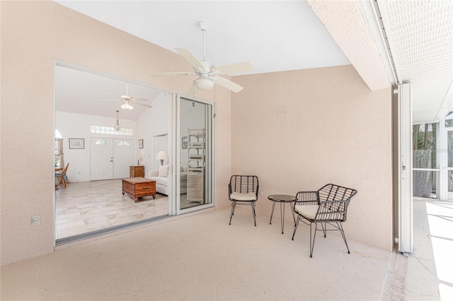 1157 Rotonda Cir, Rotonda West, FL 33947 - sitting room featuring lofted ceiling, healthy amount of natural light, and ceiling fan